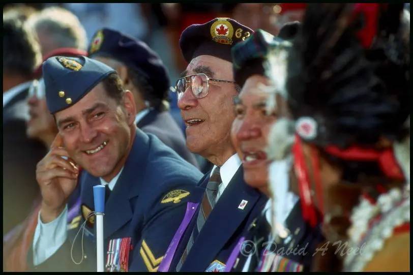 Native American war veterans share a laugh.