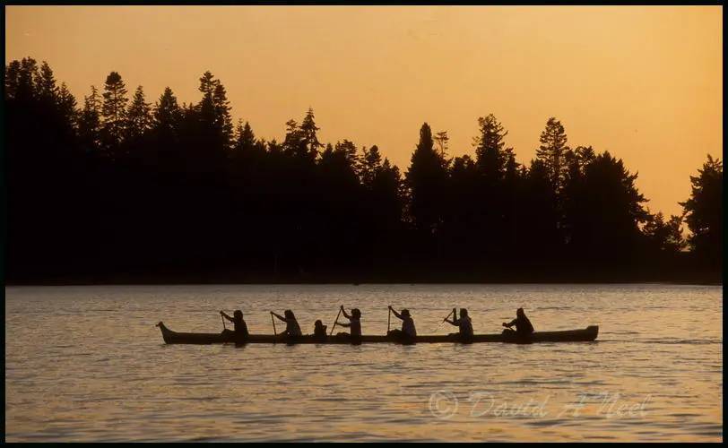 Coast Salish racing canoe at sunset.