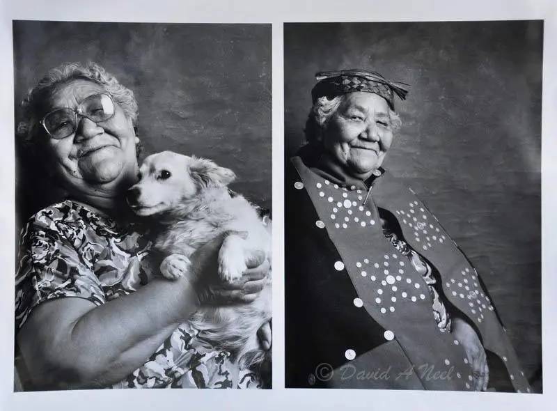 A Kwakwak'awakw elder with her pet dog.
